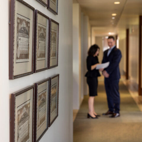 Stock Certificates With Man Woman Background