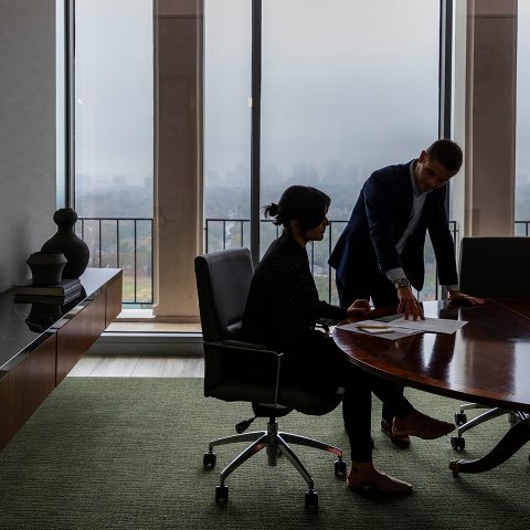News Man Woman Conference Table Shadows