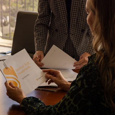 News Women Inspecting Documents